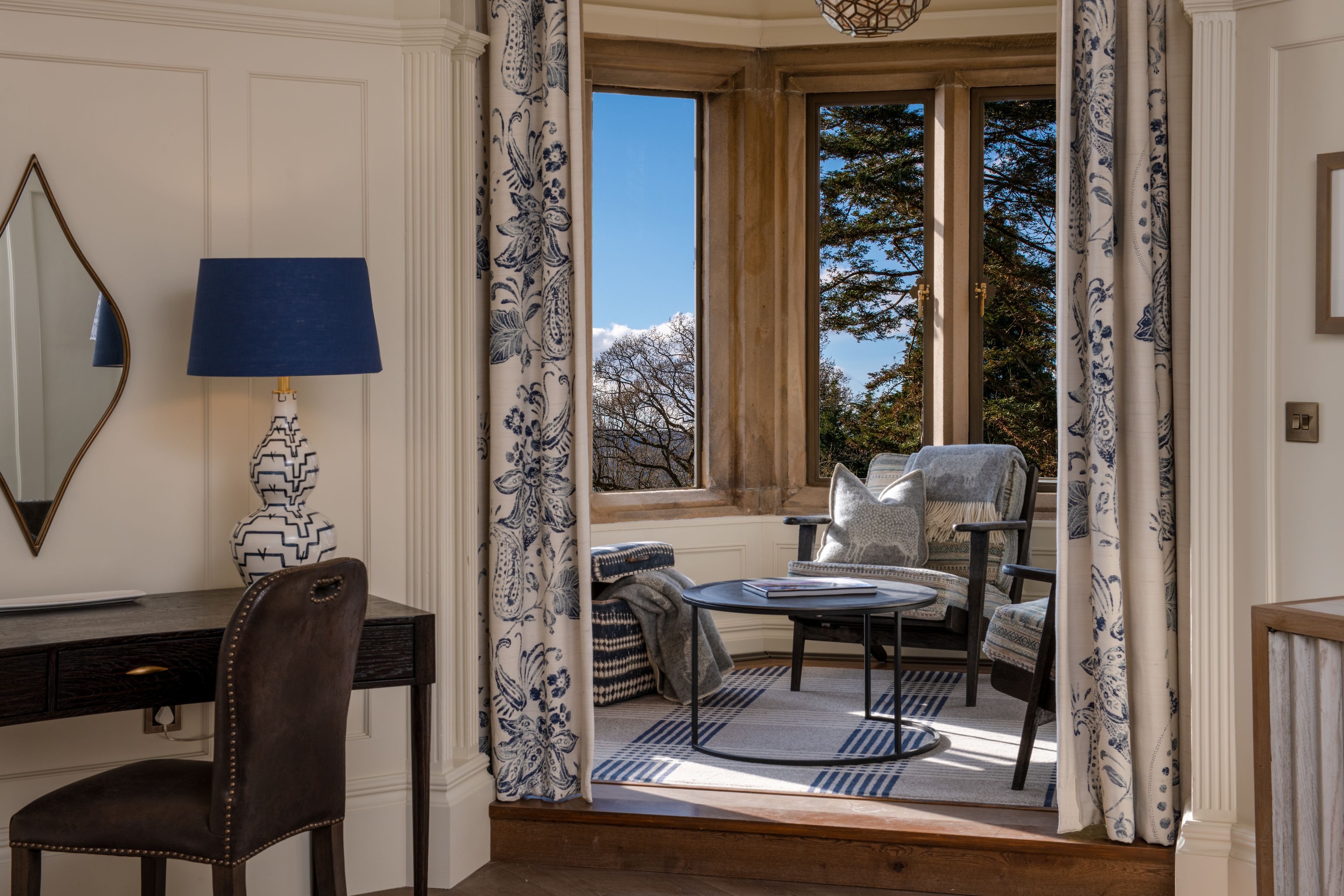 A spacious seating area in the bedroom