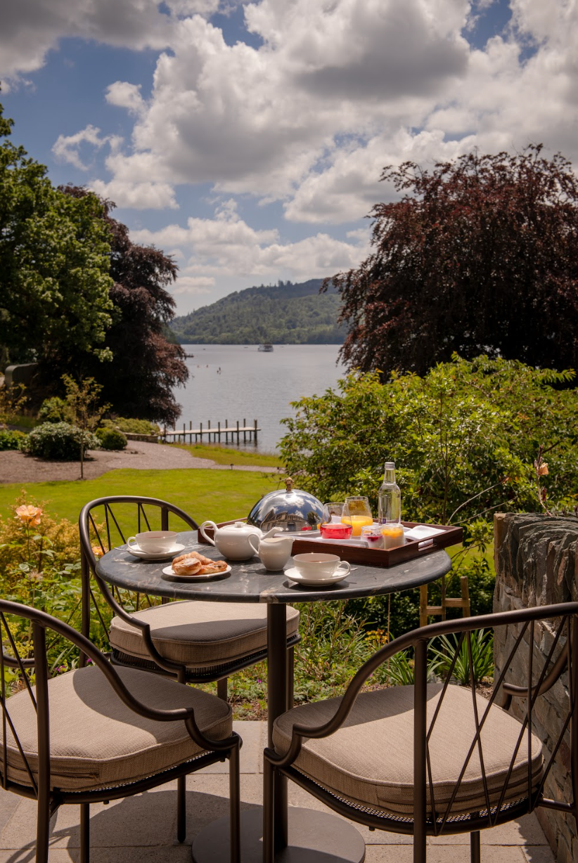 Outdoor seating opposite the lake